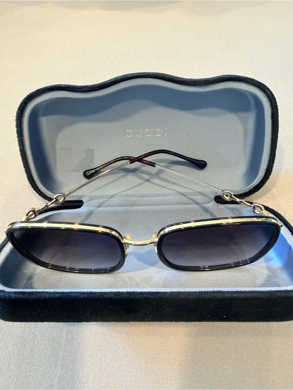 Gucci Black and Gold Oval Sunglasses